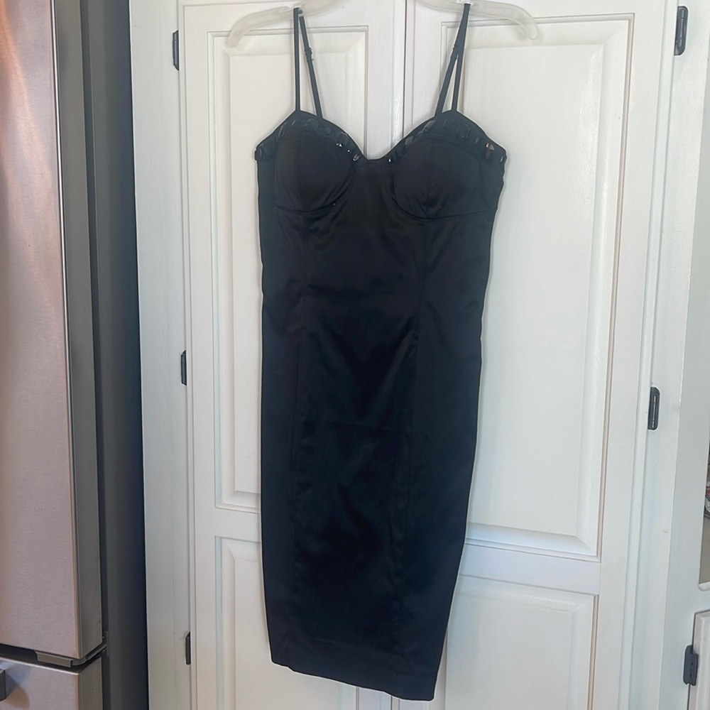 Black cocktail dress. Lace up back dress